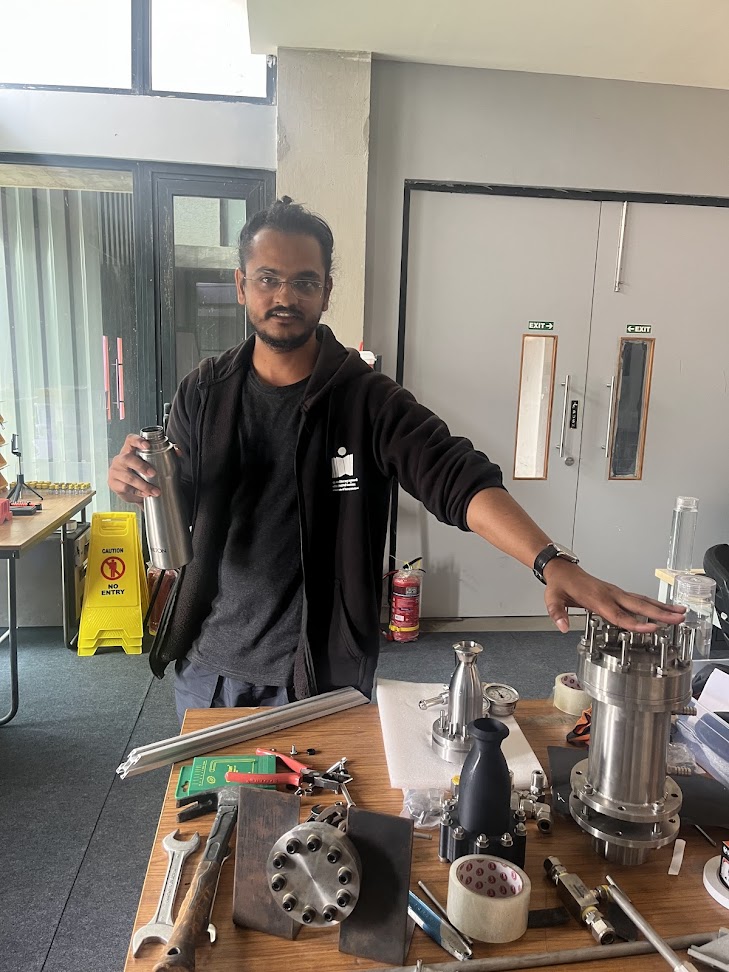 Vivek Yadav in his lab space at the Technology Innovation Park, where he is putting together a prototype of a high-capacity reusable rocket for his thesis in the MTech program in Techno-Entrepreneurship. Image: Bharti Dharapuram
